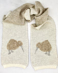 Knitted scarf with kiwi bird pattern on a white background