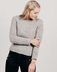 Woman wearing Brushed Alpaca Sweater with black pants