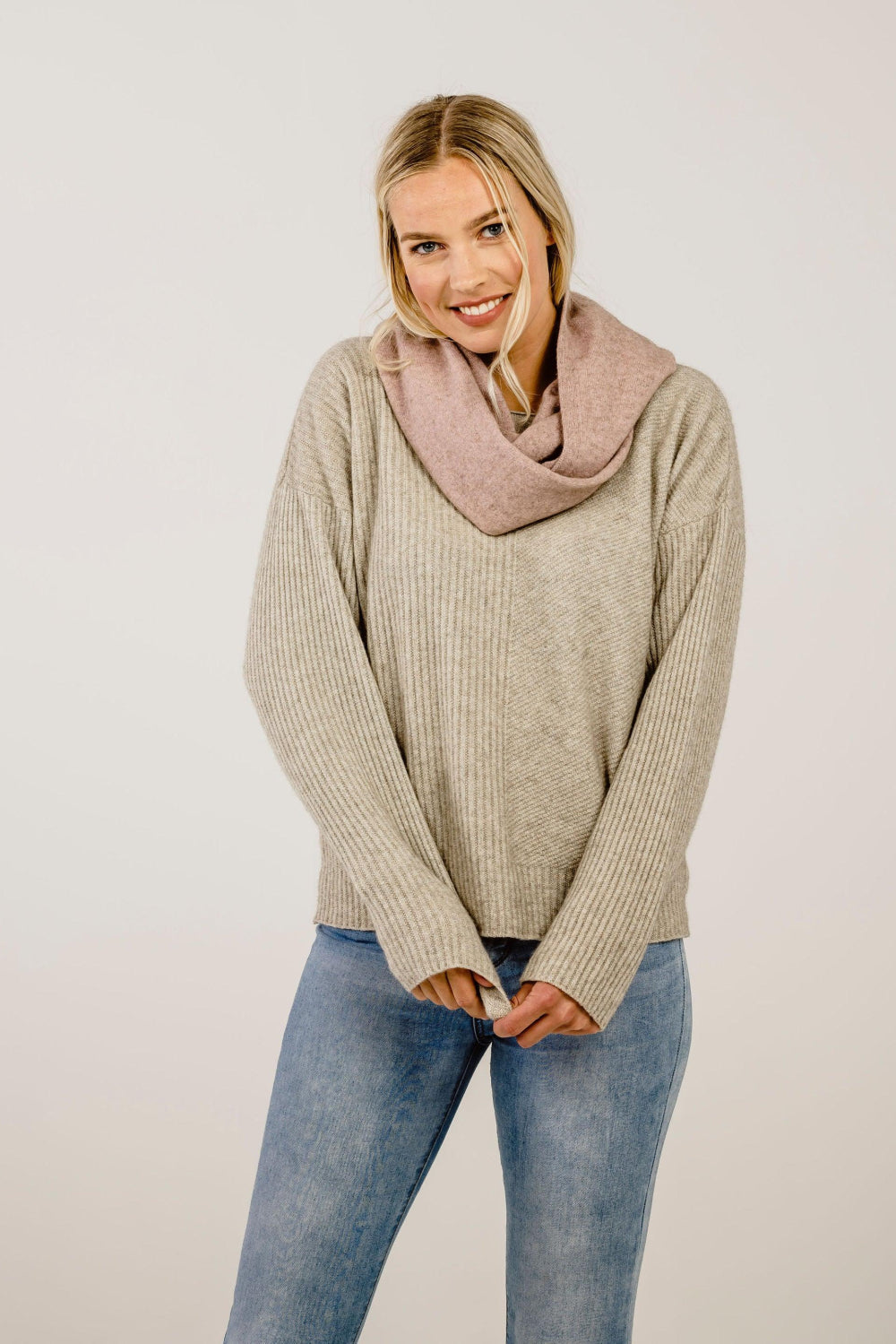 Woman wearing pink Merinosilk Loop Scarf