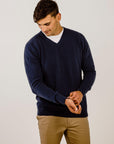 Man wearing a blue Cashmere V Neck Sweater - Kapeka NZ