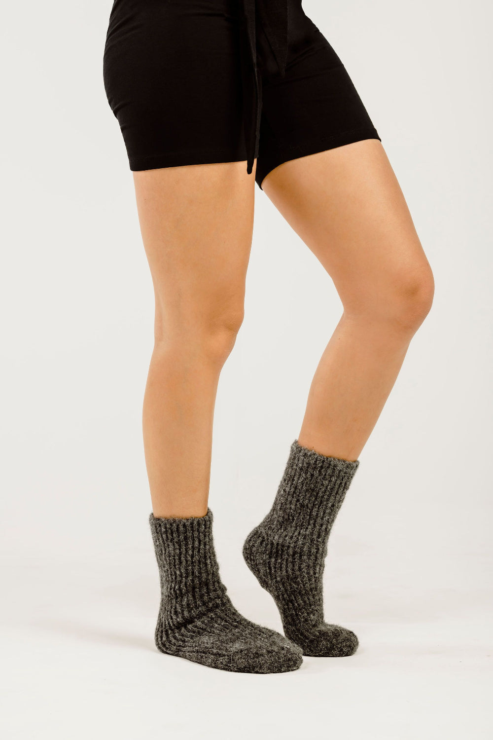 Women's legs with grey socks