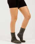 Women's legs with grey socks