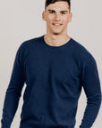 Man wearing a navy sweater