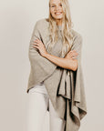 Woman wearing a lichen wrap poncho