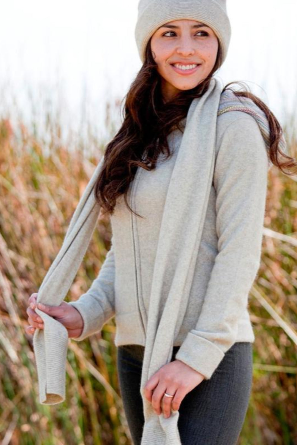 Woman wearing a lichen Merinosilk Fine-Ribbed Scarf - Kapeka NZ